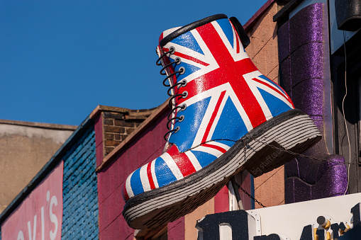 London, England, UK - March 7, 2010: Union Jack Dr Martens boot display outside shop in Camden Market