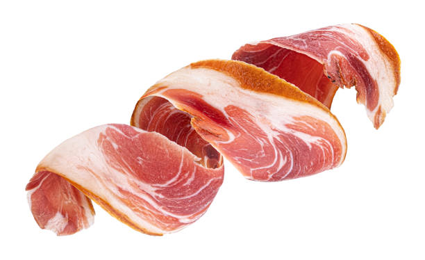 Bacon strip roll isolated on white background with clipping path Bacon strip roll, pork brisket slice isolated on white background with clipping path twisted bacon stock pictures, royalty-free photos & images