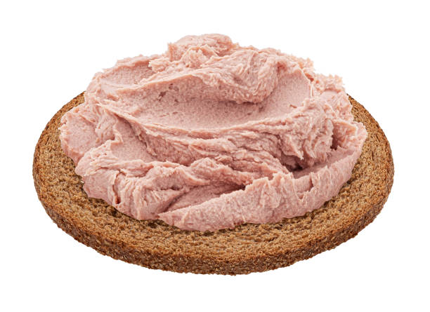 istock Bread slice with liver pate isolated on white background 1490140435