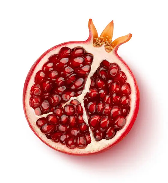 Pomegranate half isolated on white background, top view, flat lay