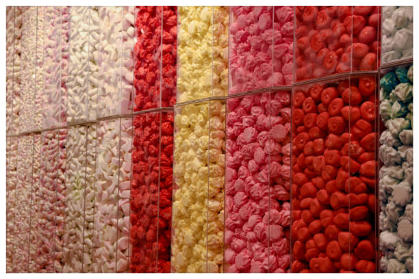 Colorful candies and gummies in a candy shop.
