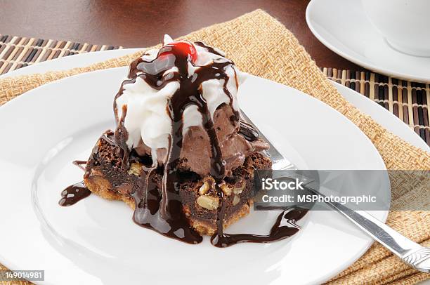 Fudge Brownie With Ice Cream Stock Photo - Download Image Now - Bowl, Brownie, Cherry