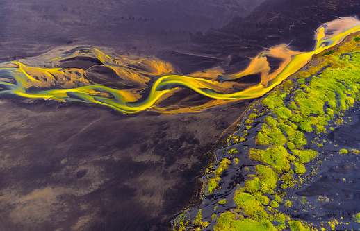 An aerial view of glacial rivers of Iceland