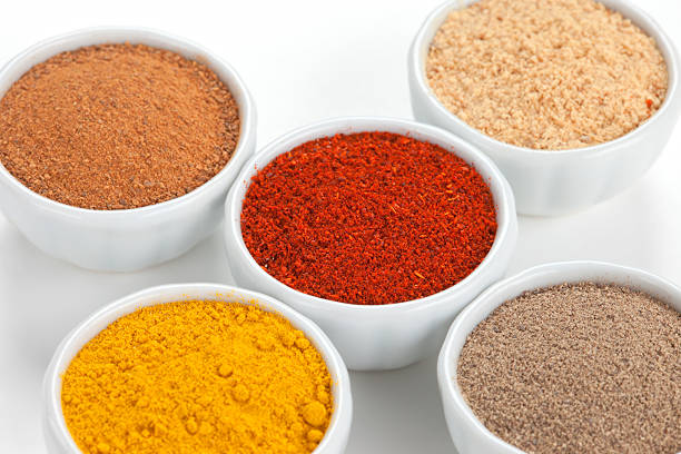istock Different spices in bowls isolated on white background. 149017141