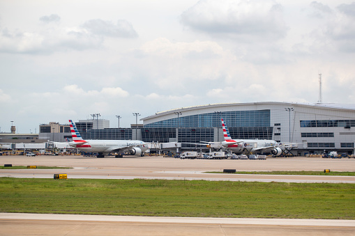 American Airlines Boeing 777-300 aircrafts parked at Terminal D at Dallas/Fort Worth International Airport in June 2022.