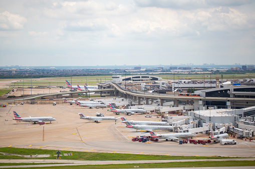 Ankara, Turkey - May 6, 2016 : General view of Esenboğa Airport in Ankara. Six planes stand by on the apron.