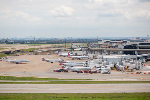 Aerial view of American Eagle airplanes parked at Terminal B at Dallas/Fort Worth International Airport in June 2022.