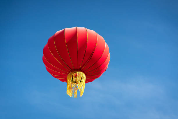Chinese red lantern against blue sky. Copy space.