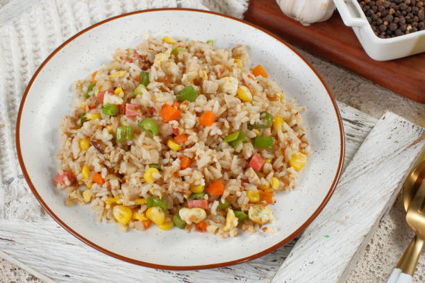 istock Fried rice with vegetables in a plate, Asian food 1490203533