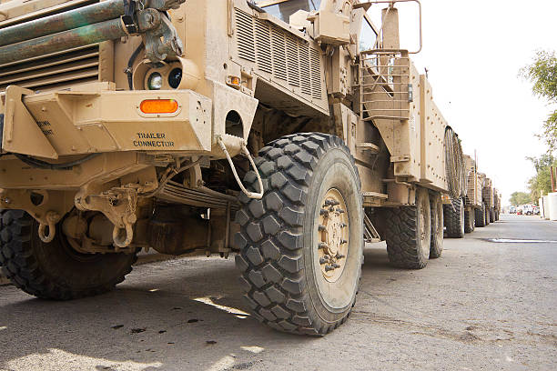 A lineup of humvees near camp ready to go out on a convoy.