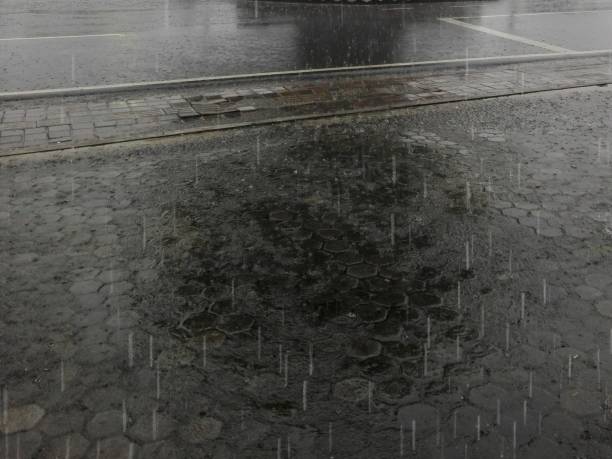 istock paved pedestrian on a rainy day 1490205467