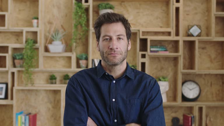 portrait of professional start up businessman staring serious looking impatient