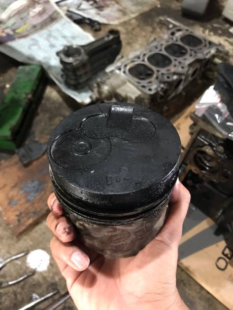 istock burning piston head due to overheat resulting in burning oil 1490215751