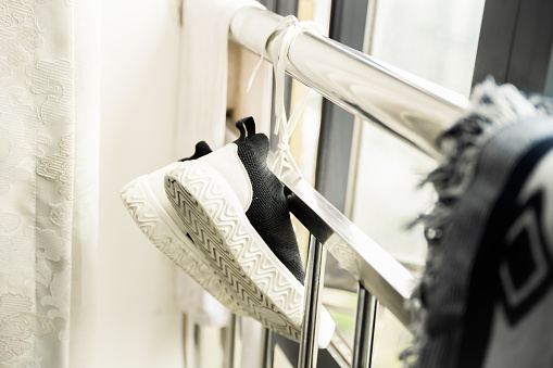 Shoes hanging on the balcony