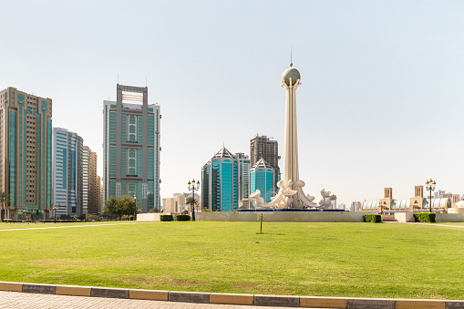 Sharjah, United Arab Emirates, March 17, 2023 : The Al Ittihad Monument at the Al Ittihad Park in Sharjah city, United Arab Emirates