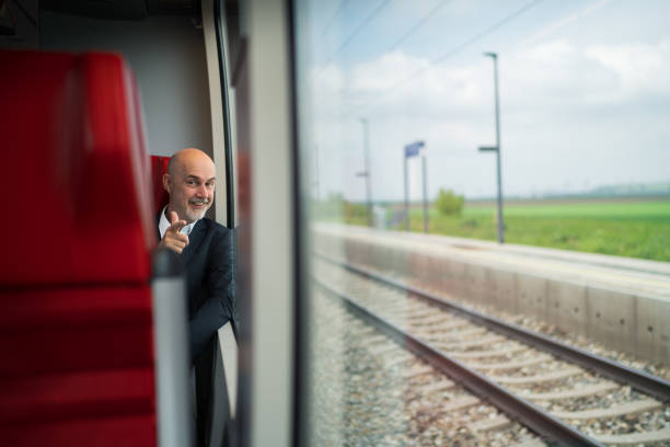 istock motivated business man traveling by train 1490223990