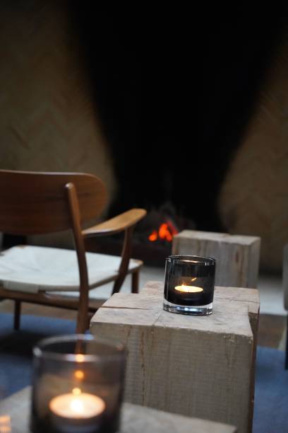 istock Close-up of a wooden cube with multiple lit candles 1490230153