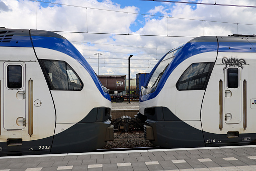 Flirt commuter trains of NS called Sprinters at station Lage Zwaluwe in the Netherlands