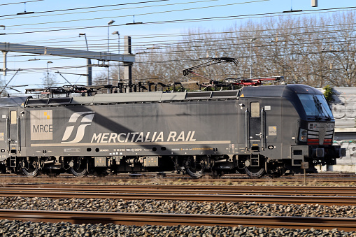 Siemens Vectron locomotive of Mercitalia cargo transport at the railroad track in Barendrecht in the Netherlands