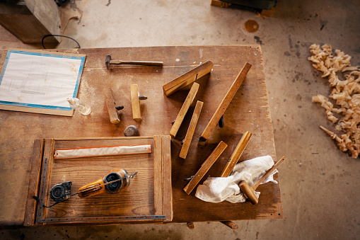 Overhead view of traditional Japanese carpentry tools in a workshop in Japan