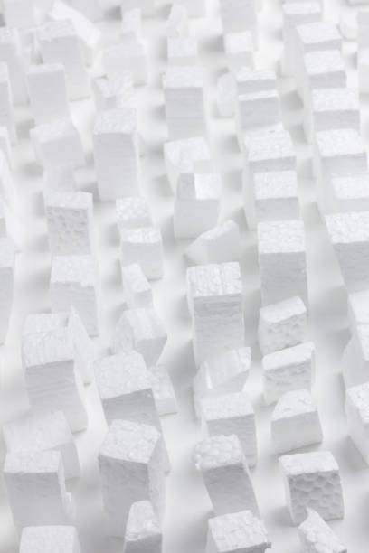 istock Model of a chaotic city made up of rectangular pieces of white polystyrene. 1490252706