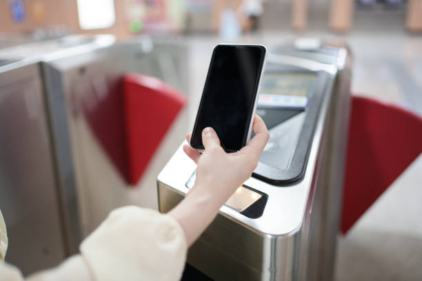 istock Mobile phone payment for public transport close-up 1490253782