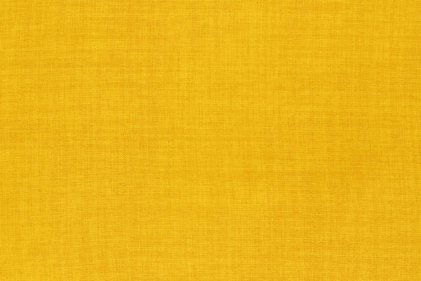istock Yellow linen fabric cloth texture background, seamless pattern of natural textile. 1490257972