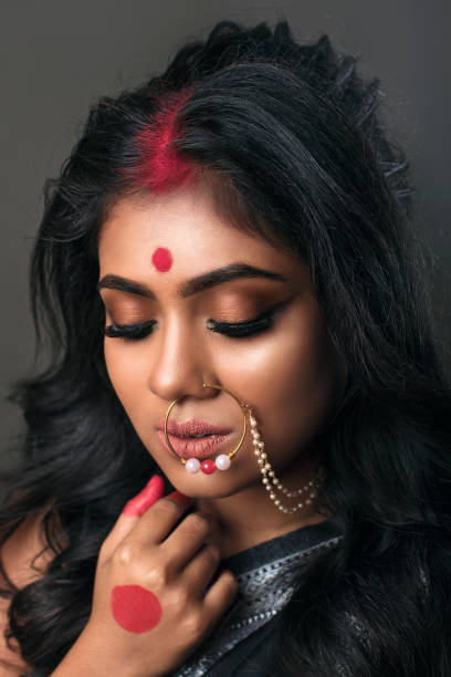 istock Young Indian Women With Bold Expression In Black Saree 1490260018