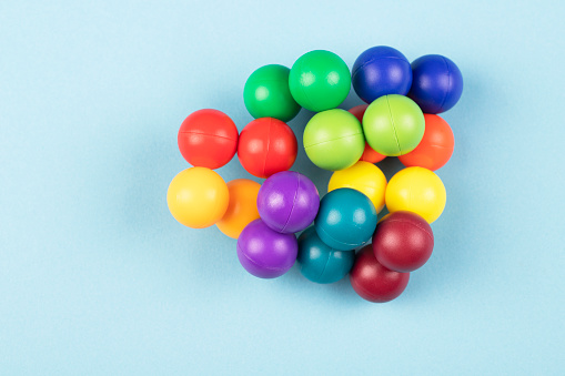 Colorful balls on blue background