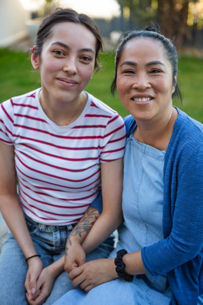 istock Mother and daughter embracing 1490265101