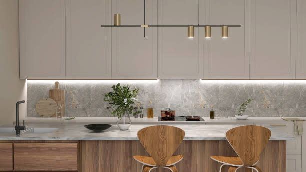 istock Modern wood dining table island, marble top, two high chairs in luxury beige kitchen counter, hidden light, granite splash back, cabinet, cupboard 1490266232