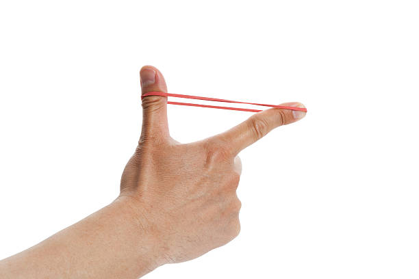 Rubber Band Shoot Stock Photo - Download Image Now - Rubber Band, Shooting  a Weapon, Aiming - iStock