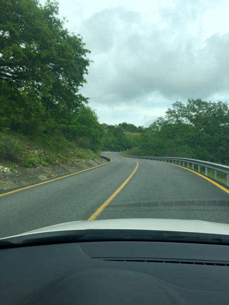 istock Driving on mountain or country asphalt road 1490276808