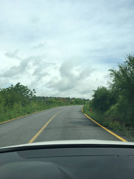 istock Driving on mountain or country asphalt road 1490276947