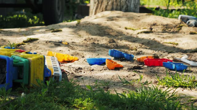 children's toys in the sandbox