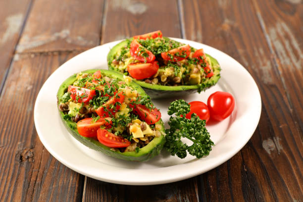 istock avocado salad with tomato,  lentils and hersb- Vegetarian mixed salad 1490283072