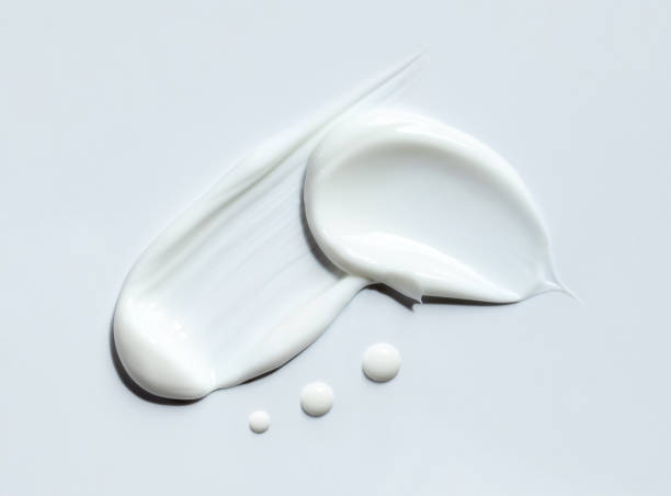 istock cosmetic smears of creamy texture on gray background 1490283077