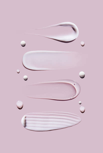 istock cosmetic smears cream texture on pastel pink background 1490283164