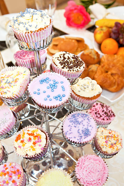 istock Variety of decorated cupcakes on breakfast table 149028332