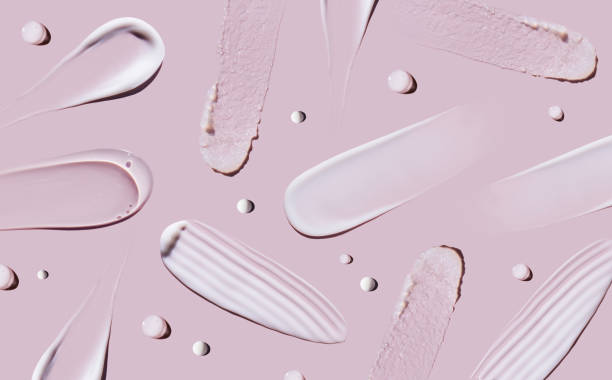 istock pattern cosmetic smears cream texture on pastel pink background 1490283324