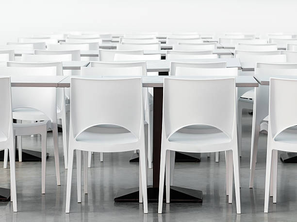 istock Empty lunch room with modern styled white chairs and tables 149028360