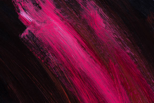 istock pink color on black background 1490284850