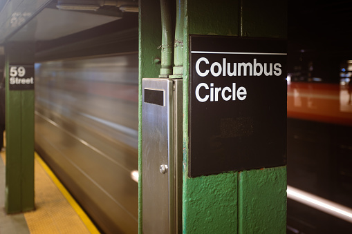 The blurred motion of a passing train adds a sense of rhythm to the iconic Columbus Circle station. Discover the harmony between movement and stillness in this urban hub.
Fun Fact: Columbus Circle station, opened in 1904, was originally named 
