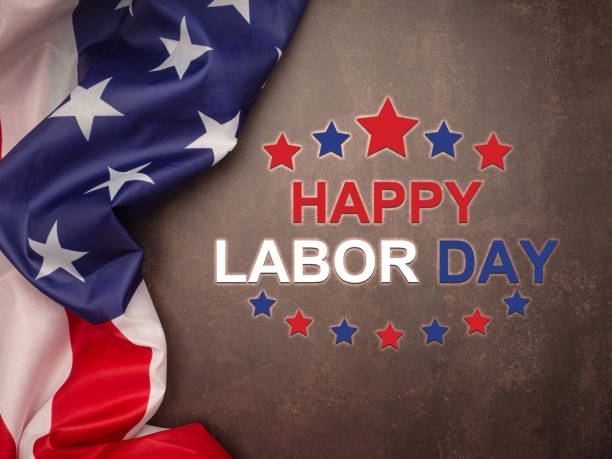 istock Happy labor day text over a cement floor background and American Flag. 1490292561