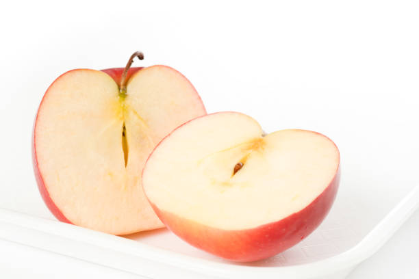 Apple on white tray