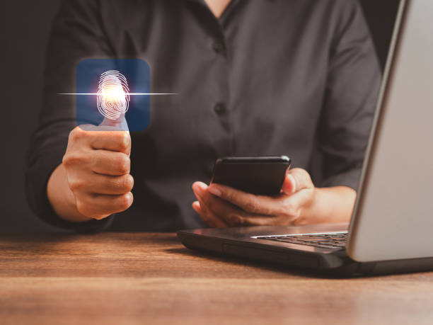 istock Businessman scans fingerprint biometric identity to access personal data. 1490294616