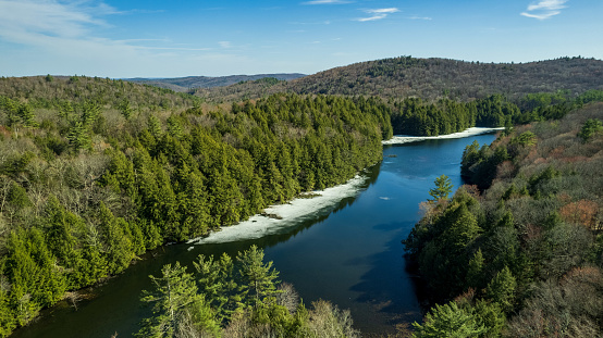 Sweet Pond State Park in the Green Mountains of Vermont starts to blossom a beautiful green on this beautiful spring day.