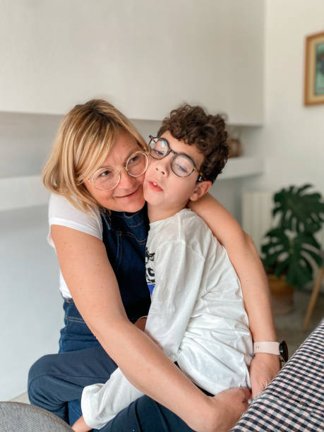 istock Loving mother with disabled son sitting on top 1490298500
