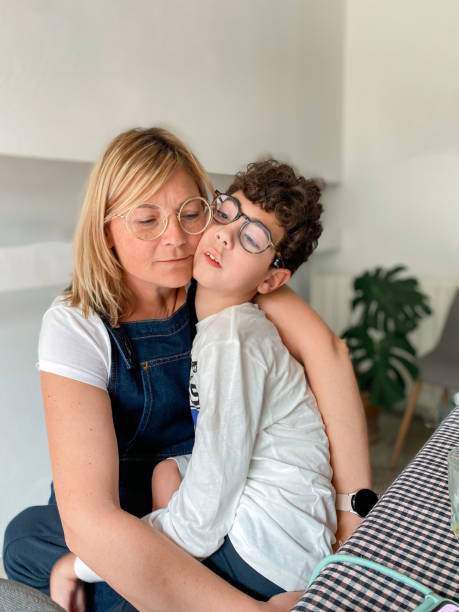 istock Loving mother with disabled son sitting on top 1490298505