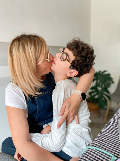 istock Loving mother with disabled son sitting on top 1490298516